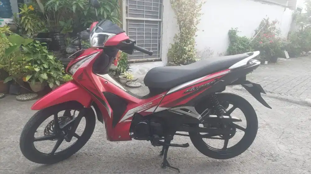 HONDA SUPRA X 125 HELM IN INJEKSI 2012
