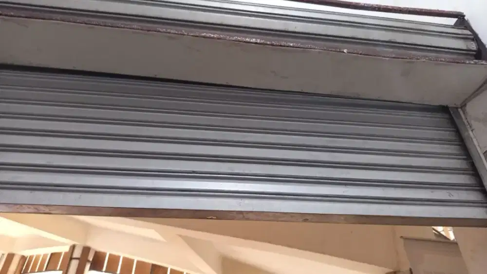 Tukang spesialis service rolling door folding gate murah