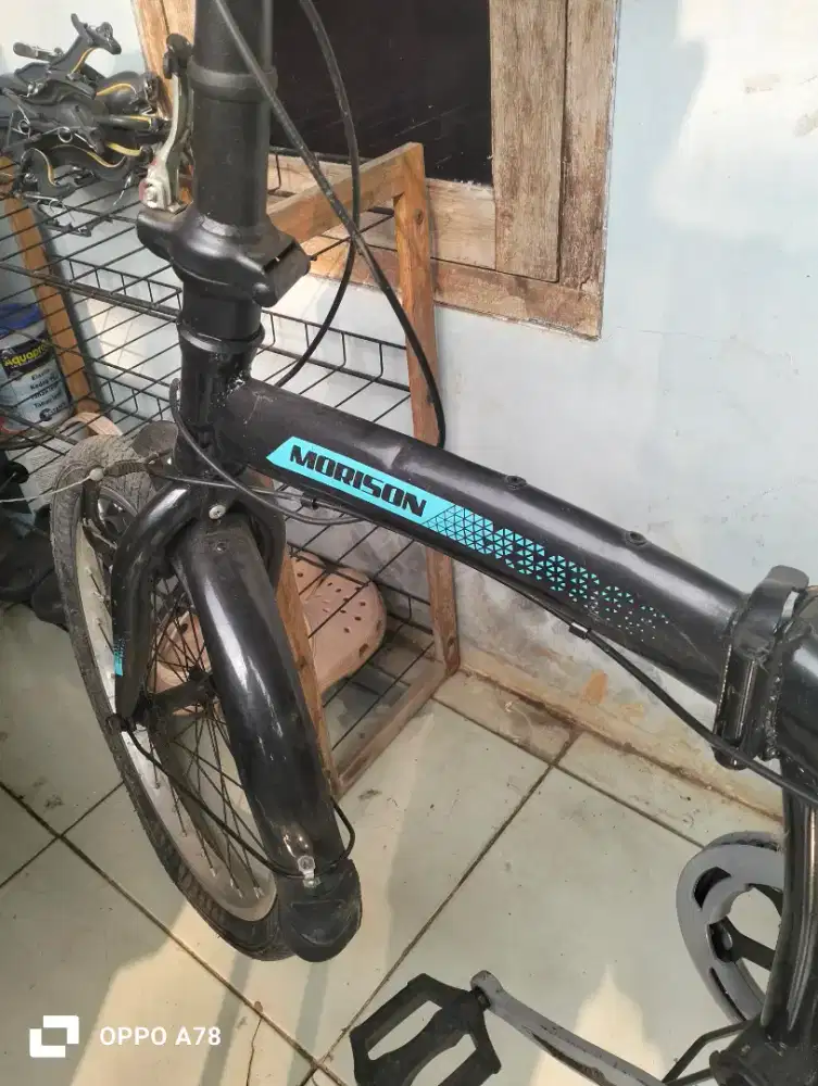 Sepeda lipat wanita merk morison