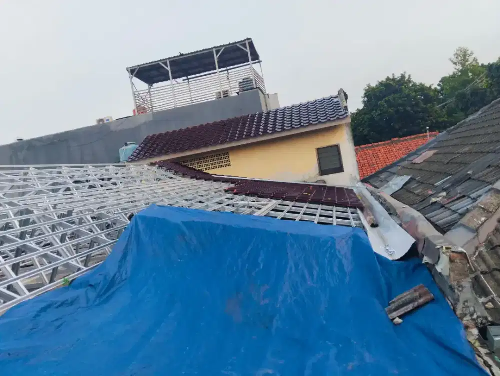 Renofasi atap ganti baja ringan
