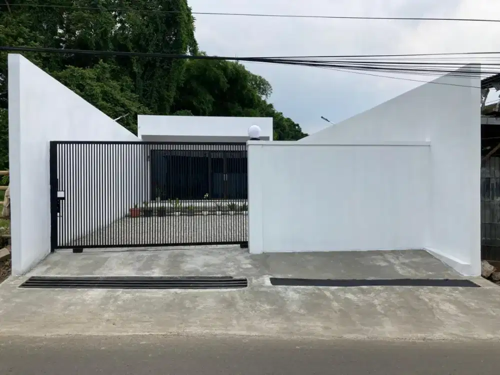 Rumah unik kotak putih nyaman