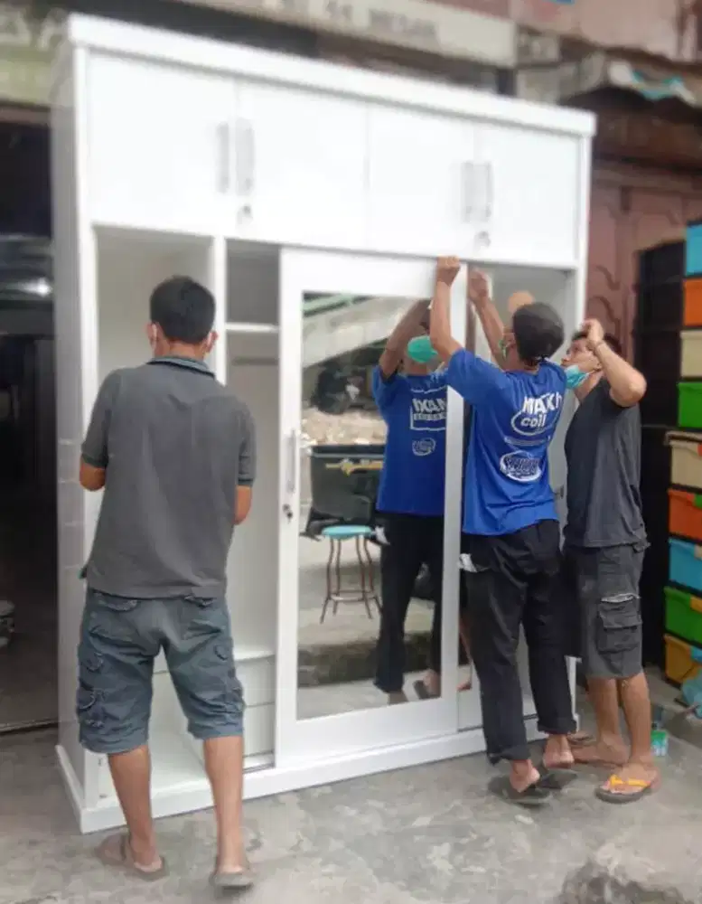 JASA BONGKAR PASANG LEMARI PINDAHAN