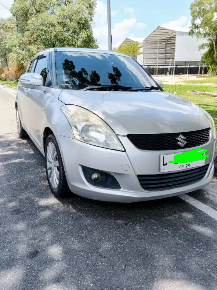 Suzuki Swift Tahun 2014 Manual GX Warna Silver