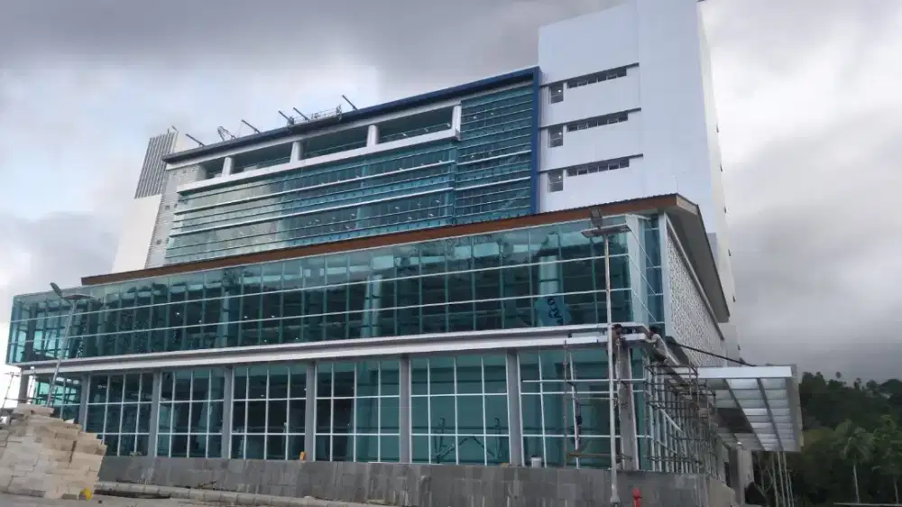 Jasa pemasangan kaca gedung curtain wall