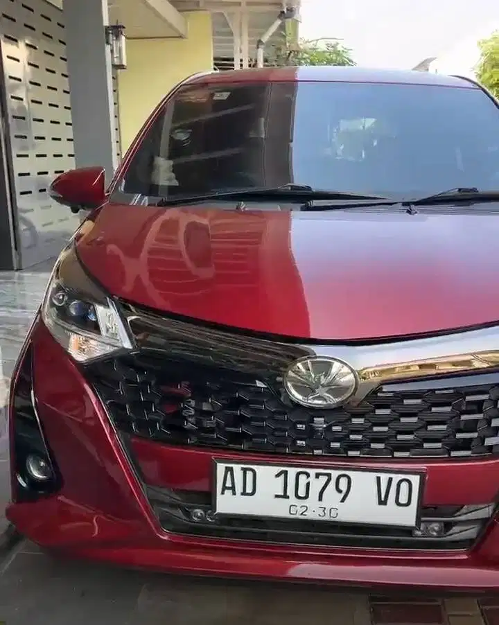 MOBIL CAYLA AT TAHUN 2025 MERAH MARUN