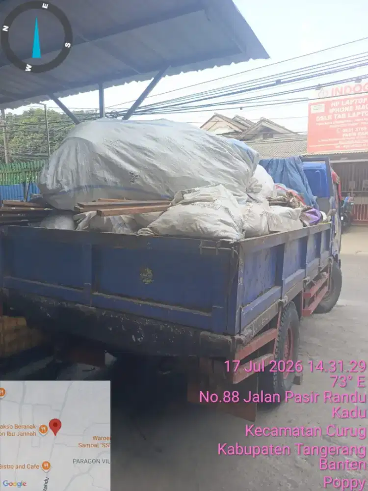 Buang puing dan tanah