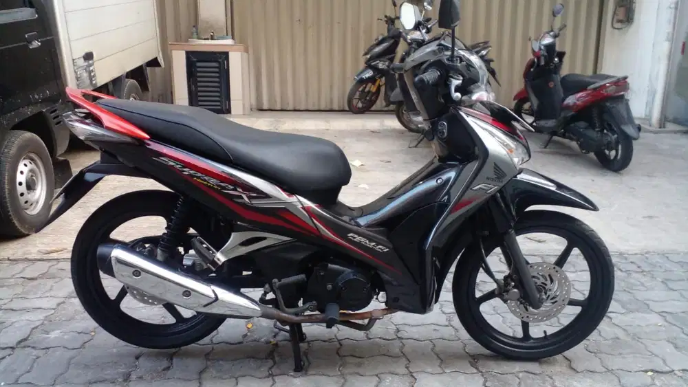 Honda Supra X 125 helm in tahun 2013.