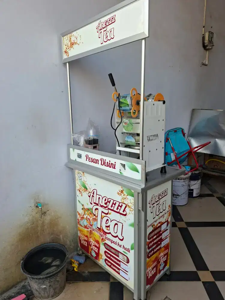 Dijual Meja Es Teh Alumunium & Mesin Sealer Merk Omicko