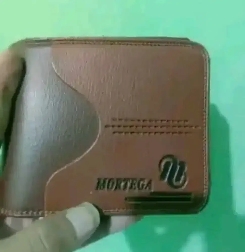Dompet mortega masih baru