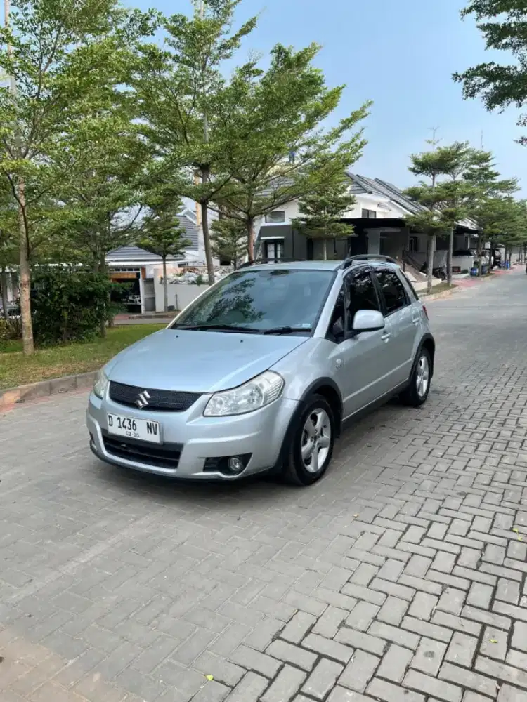 DP 5 JT | SX4 X OVER 2010 MANUAL