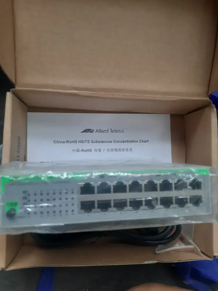 Hub link 16 port merk alied tellesis dan power supply 450 watt