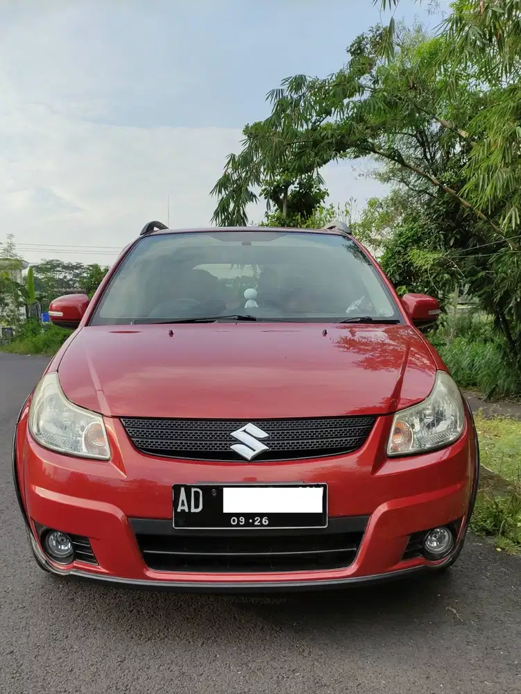 Suzuki SX4 X-Over Manual Orange Metalic Ori