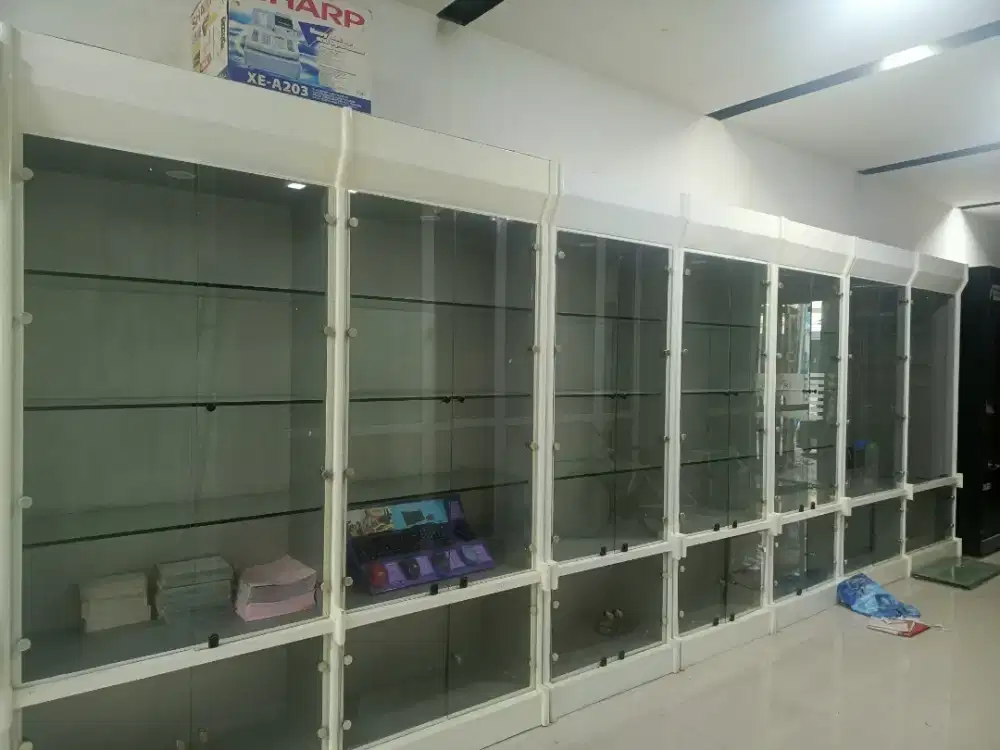 Jual lemari kaca 7 meter, rak besi dan meja meeting