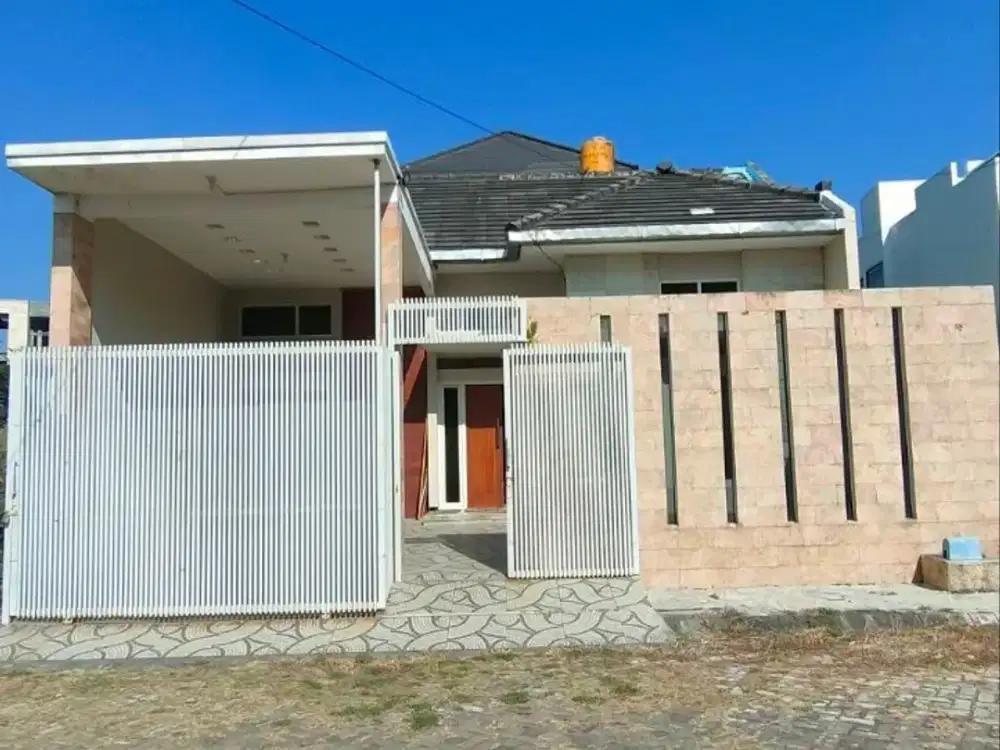 DIJUAL Rumah Cantik Modern Minimalis Siap Huni Keamanan 24 Jam Akses Jalan Lebar dan Selangkah ke Almahira IIBS dan Kampus ITN 2 di Tirtasani