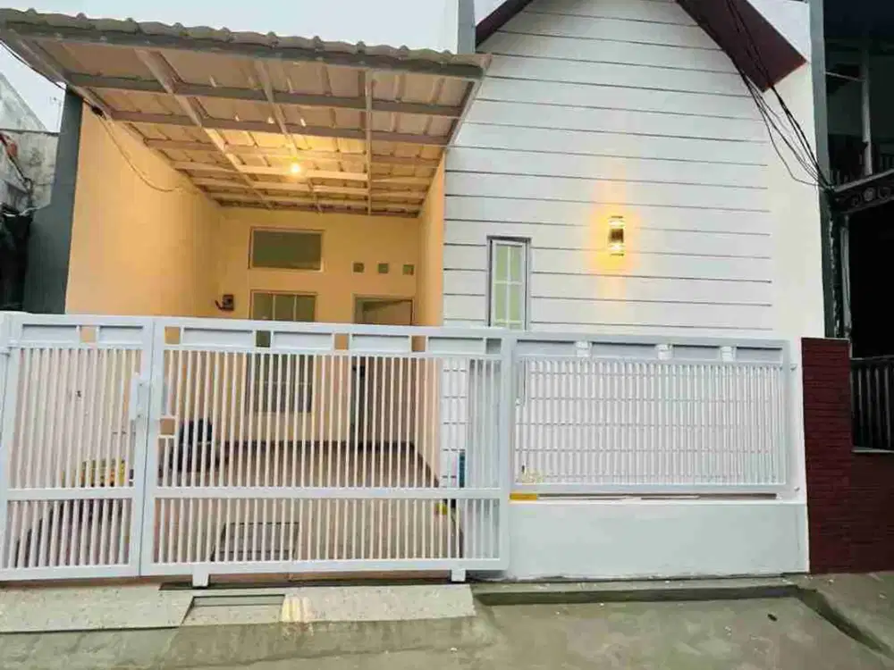Rumah bangunan baru 450 jt di pondok Timur Indah bekasi
