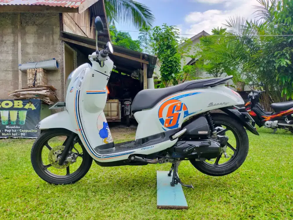 Scoopy Fi eSP dengan ACG Starter dan fitur Idling Stop System (ISS)