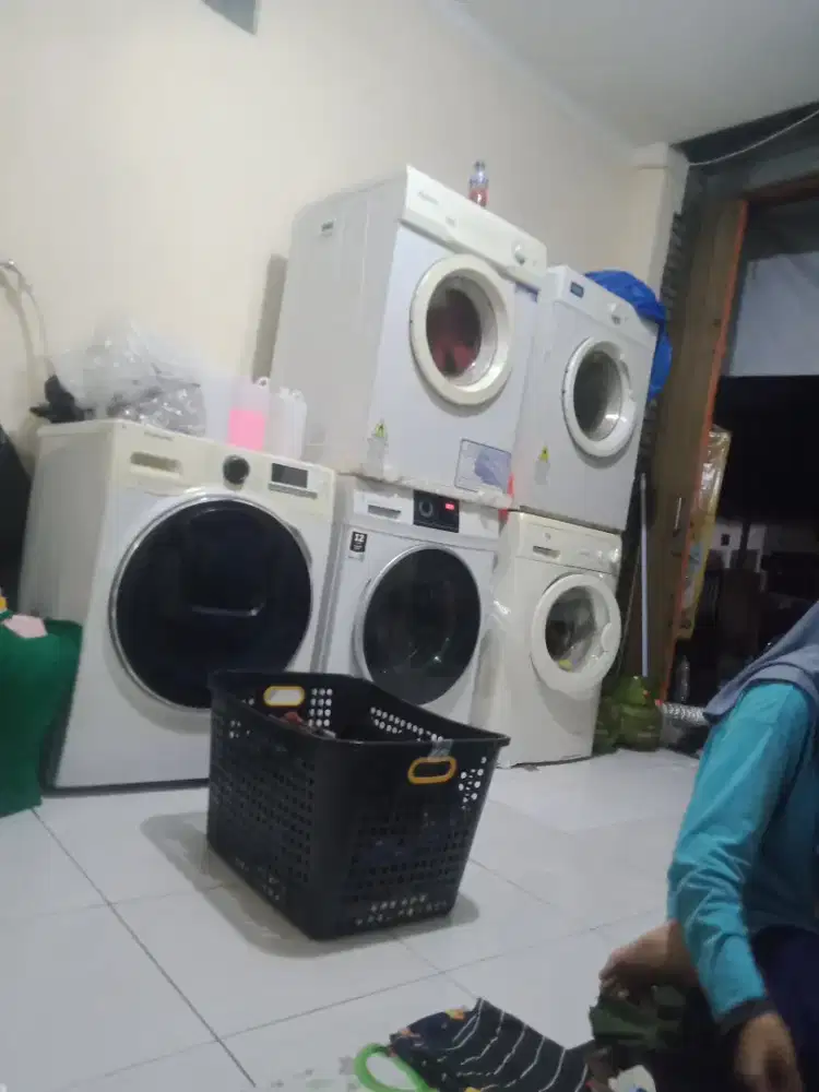 Servis spesialis mesin laundry