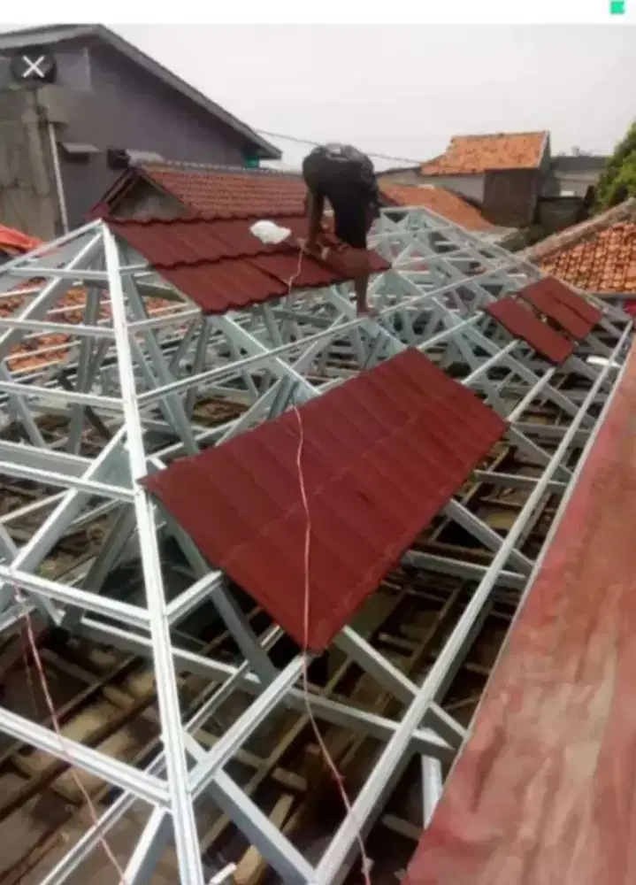 Renovasi rumah ganti atap baja ringan masang kenopi keramik dll