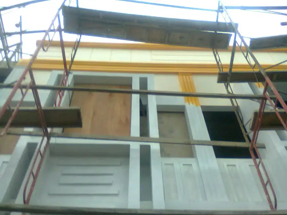Tukang cat bangunan