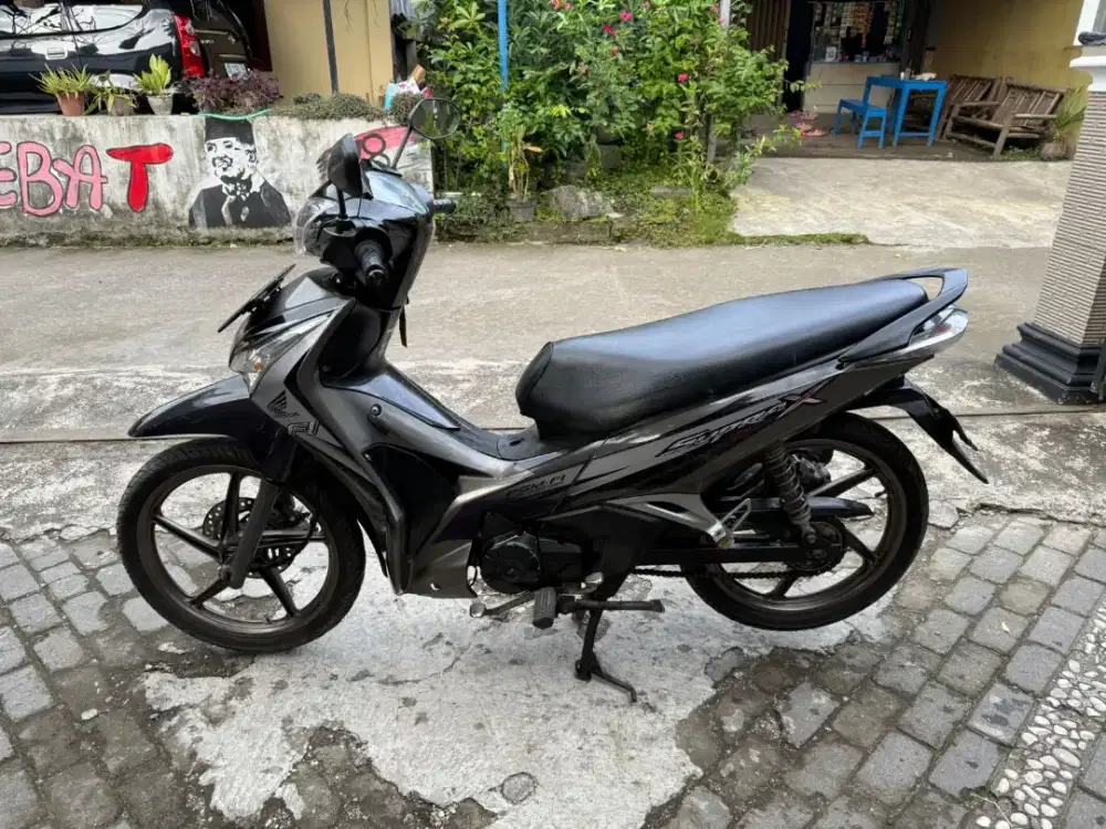 Honda Supra helm in injeksi THN 2012 plat AB Wonosari