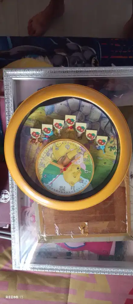 Jam dinding bekas POOH DISNEY NET 650rb