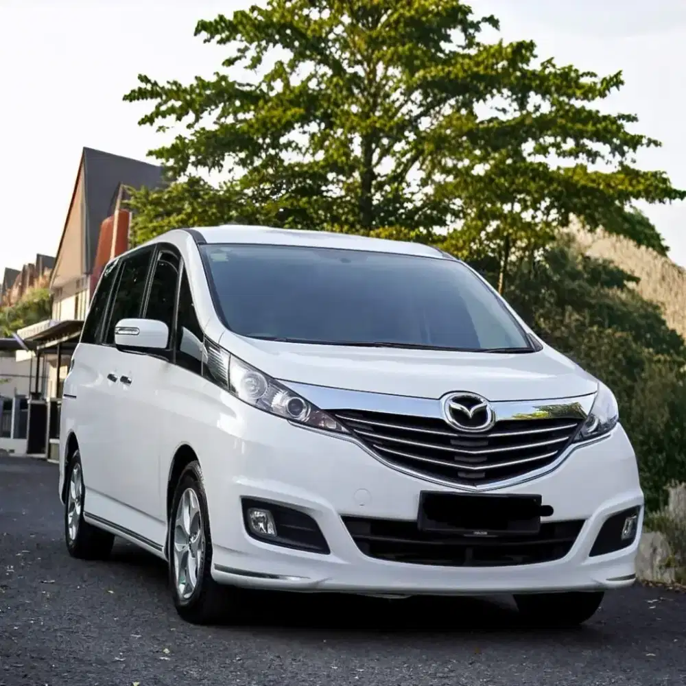 km 20rb Mazda Biante 2015 tangan 1
