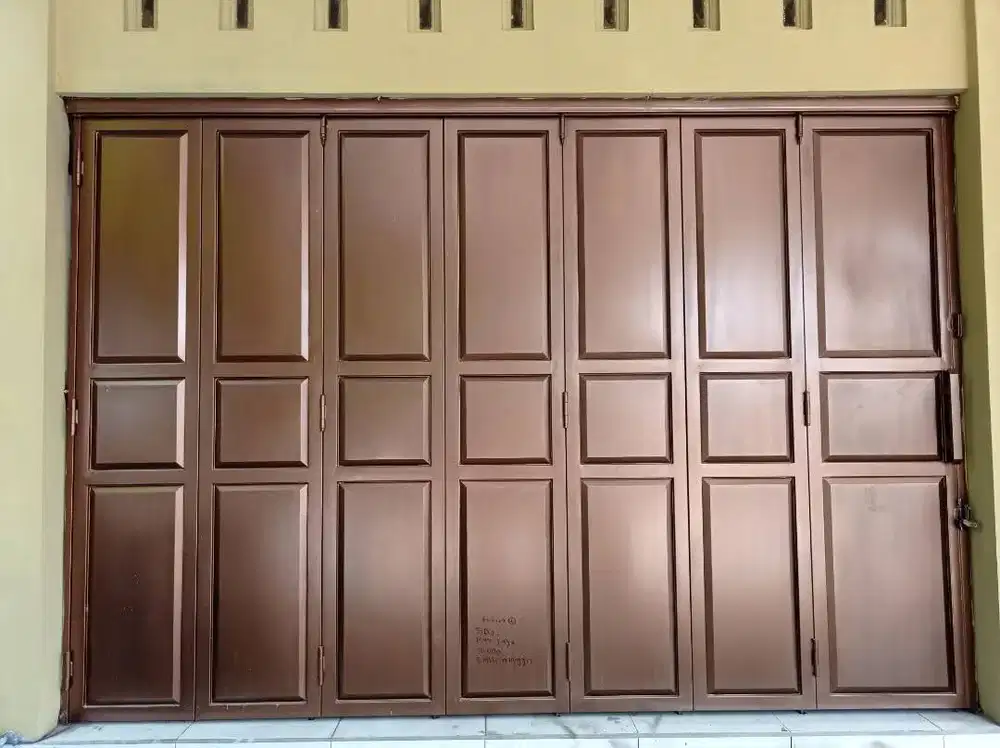 pintu garasi bahan besi hollow