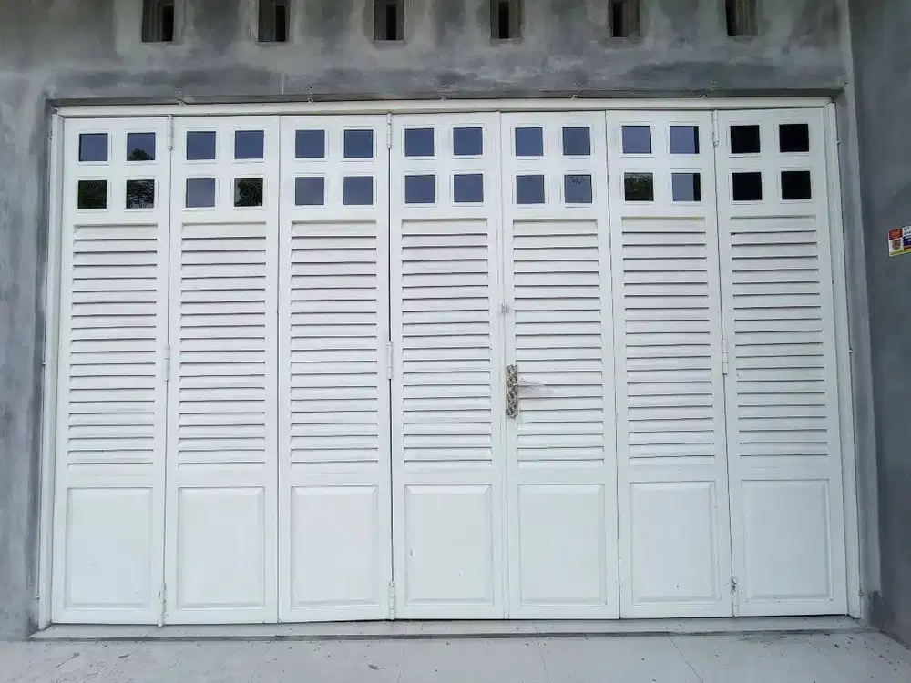 pintu garasi besi hollo model sliding nikung