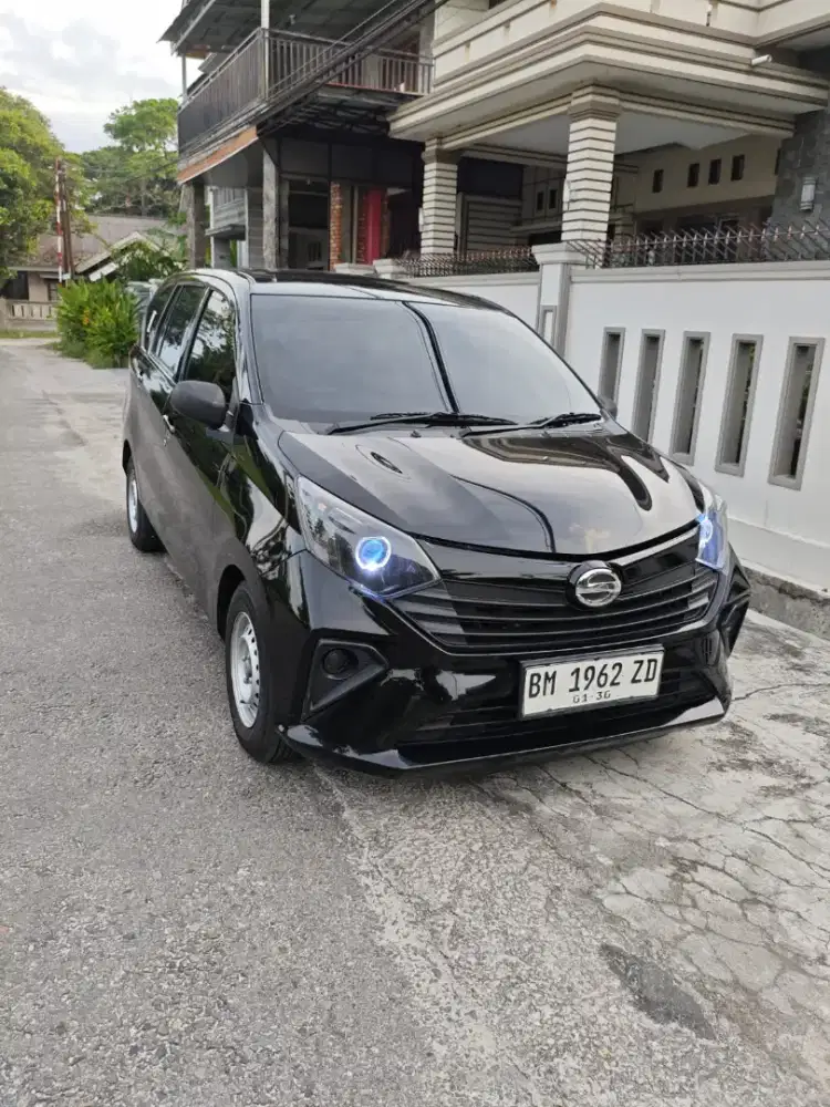 Sigra D manual th 2024