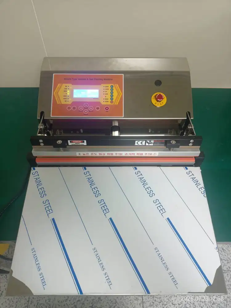 mesin Packing / perekat plastik ( Vacum + Sealling )