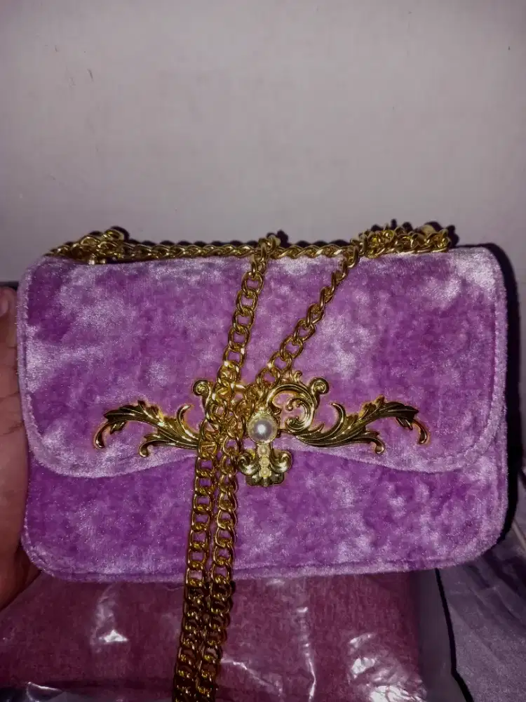 TAS ORI CHARLES AND KEITH