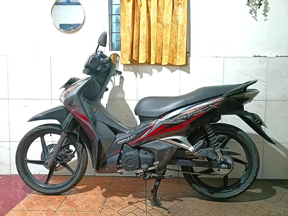 Supra x 125 helm in tahun 2012 dobel disc/tt boleh cash lebih bagus