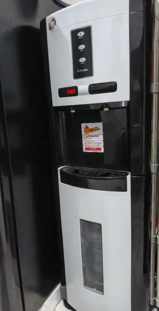 Dispenser bekas serasa masih baru