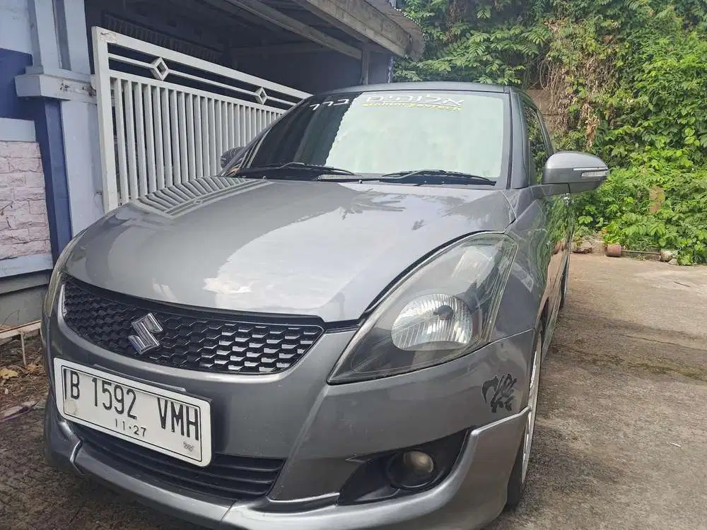 Suzuki All New Swift 1.4 GX MT 2013 Bensin