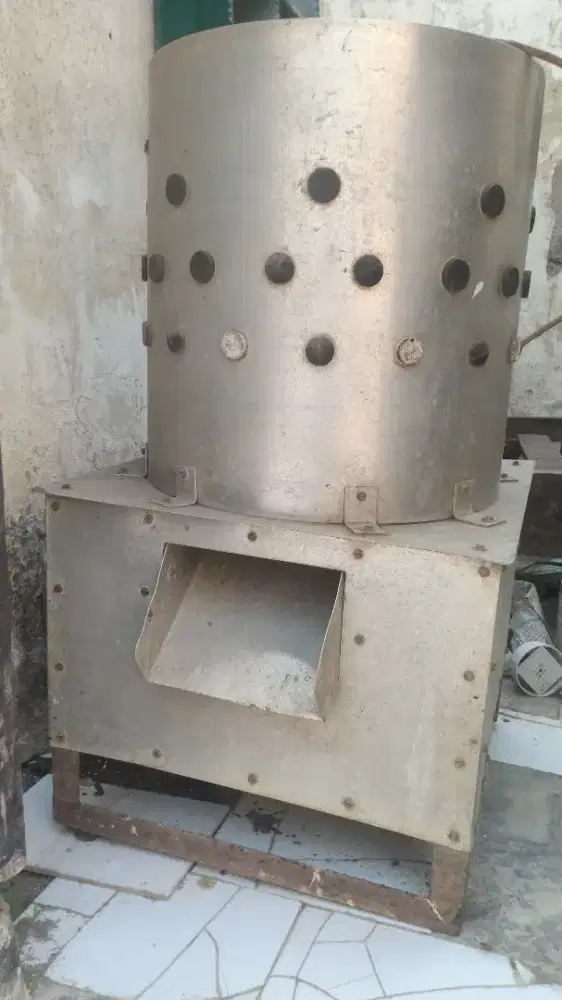 Mesin perontok bulu ayam