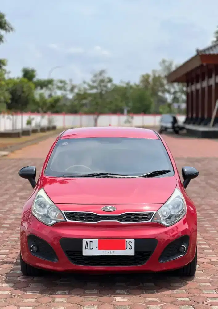 KIA RIO 2013 MATIC MERAH METALIC ISTIMEWA