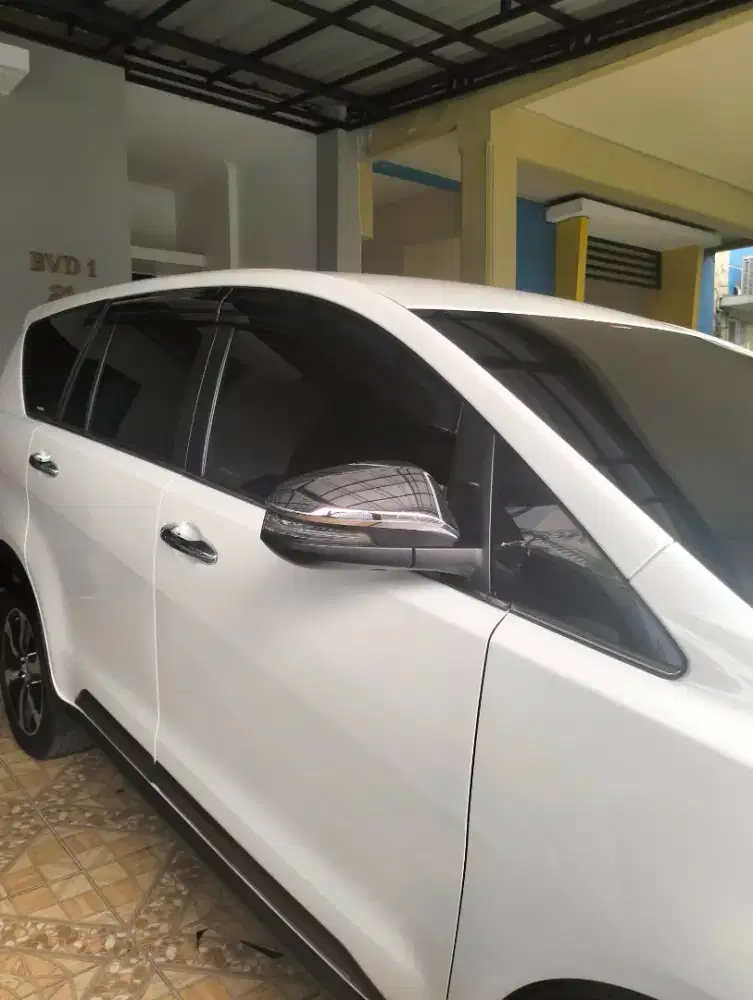 Lapak pemasangan kaca film mobil