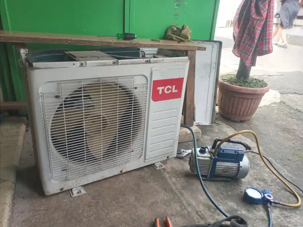 Service dan bongkar pasang ac