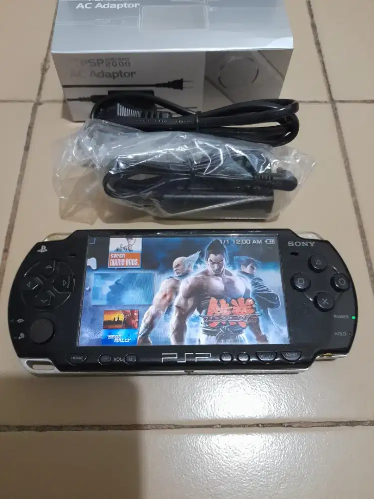 ual Psp Slim Seri 2000 masih cakep.Memory 16gb Full game plus Musik