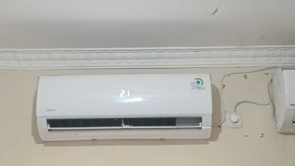 AC midea 1 pk low daya