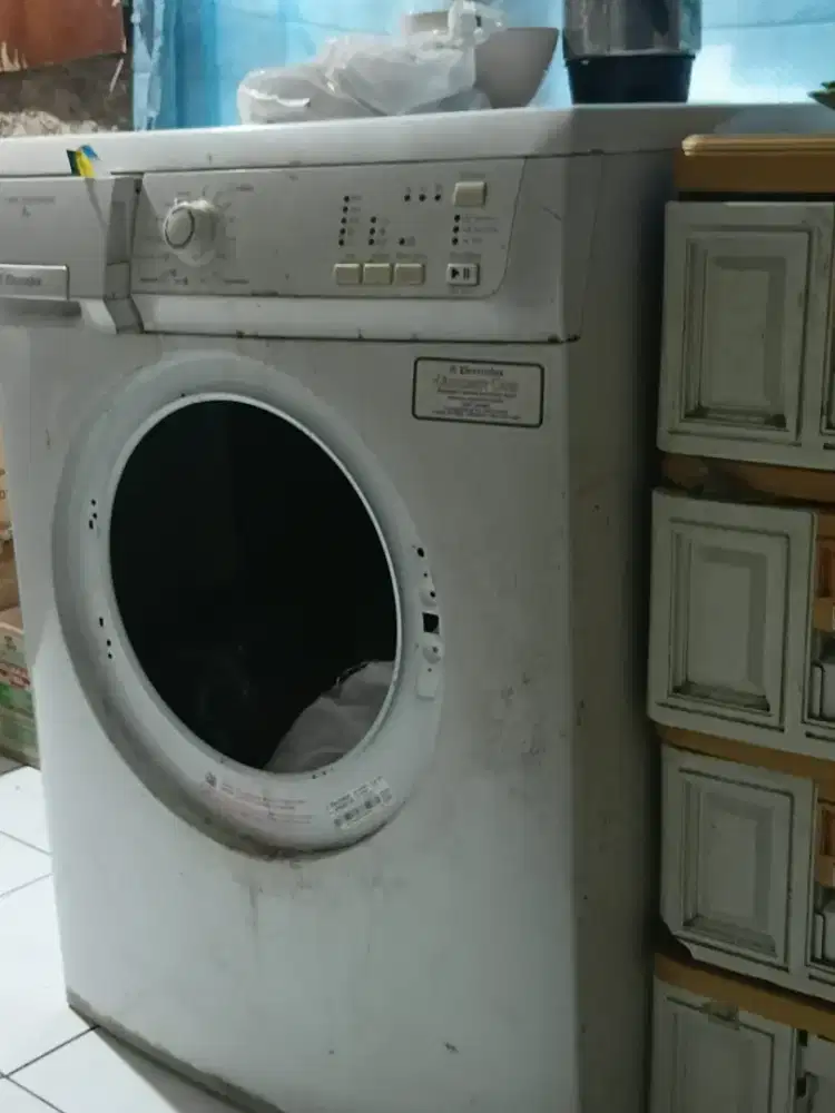 Casin mesin cuci elextrolux