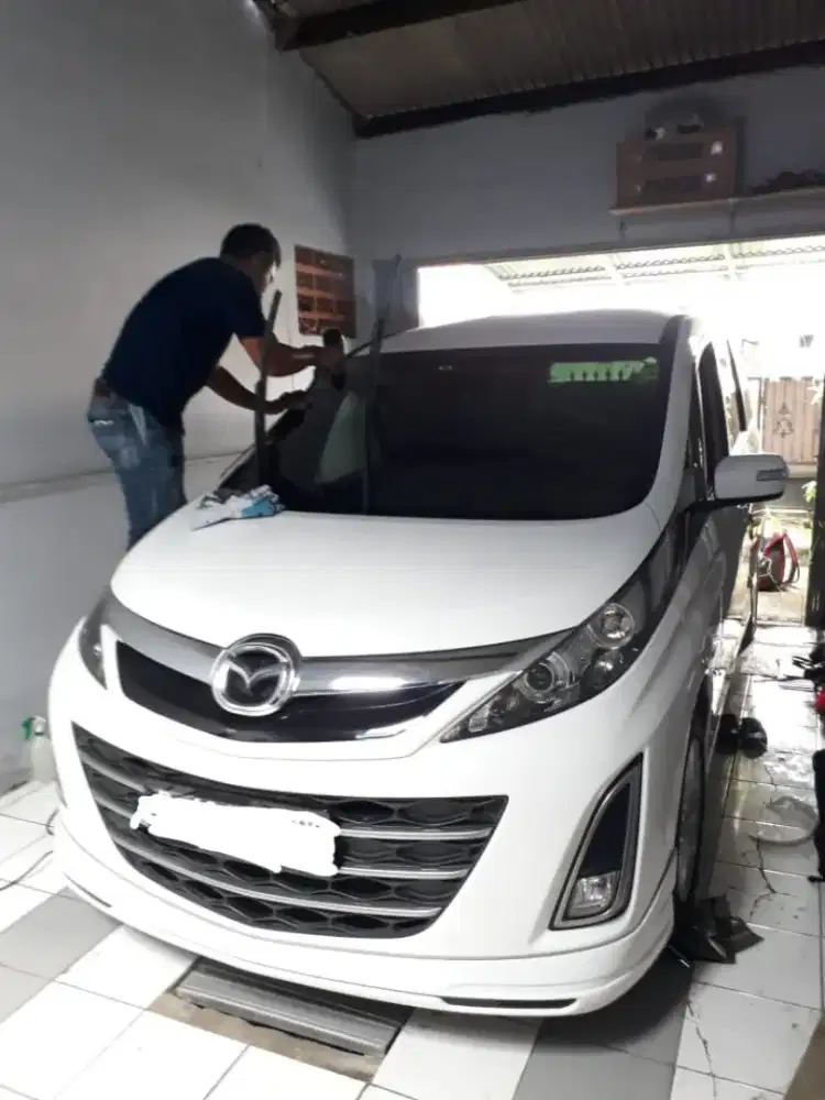 Raja nya pasang kaca film mobil