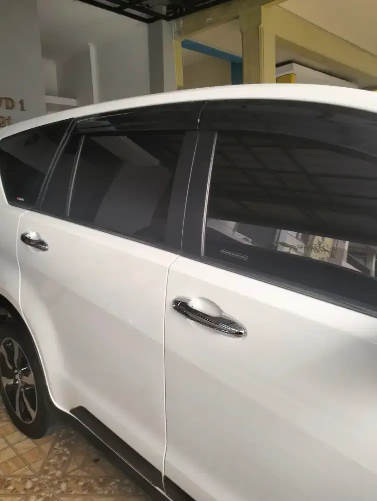 Lapak pemasangan kaca film mobil