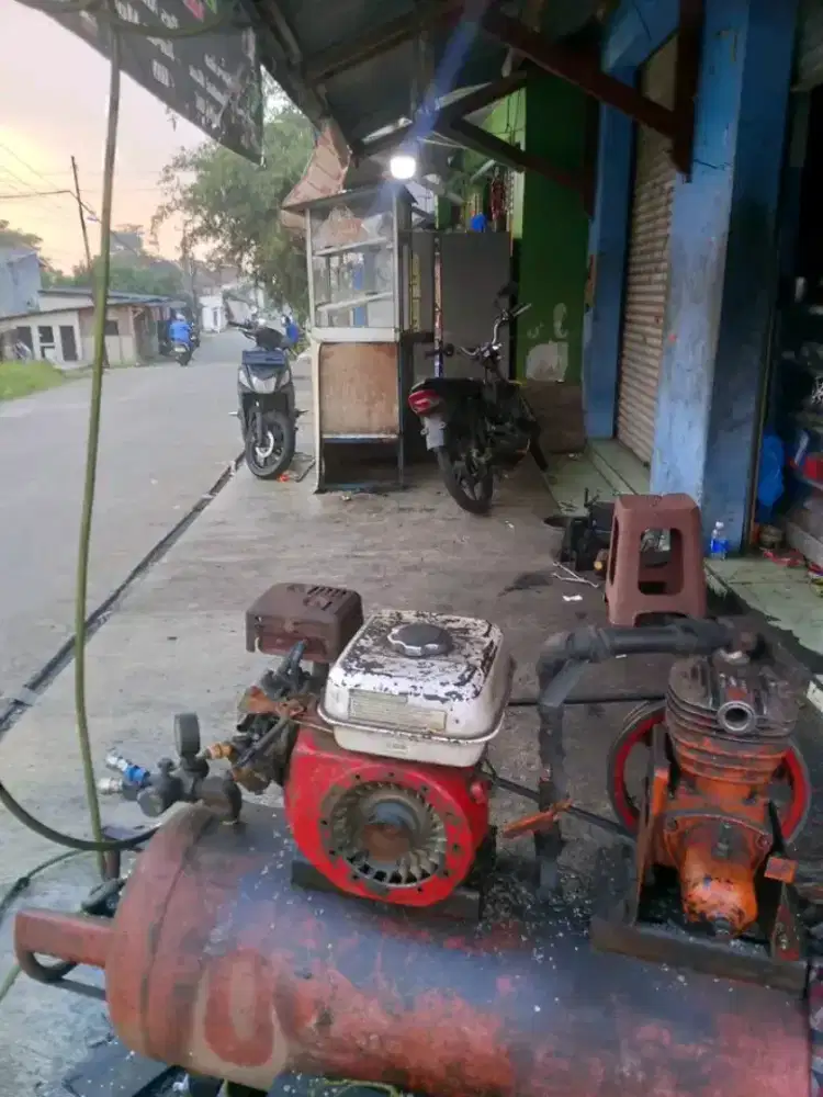 Over usaha Bengkel dan Tambal ban