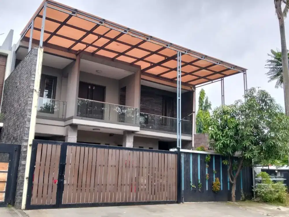 Rumah Full Furnished Hadap Timur SHM - Banjarwijaya Dengan Pool