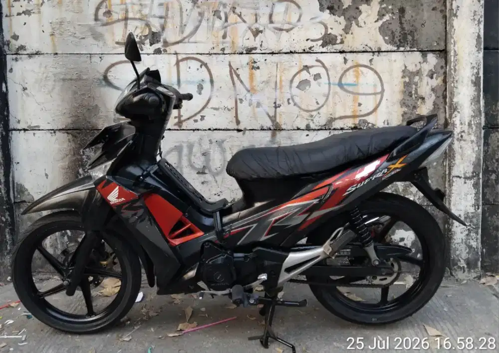 Supra X 125 karburator th 2010 B DKI