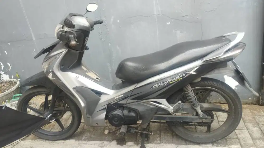 Honda Supra X 125 Helm In karburator Tahun 2011