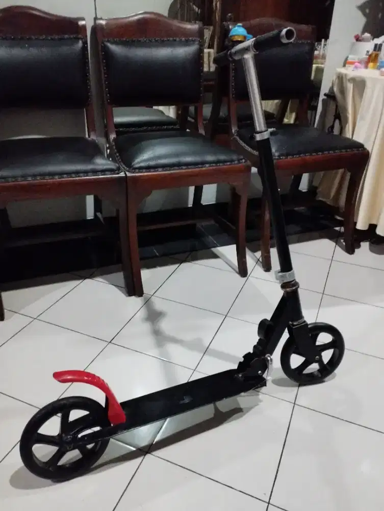 Scooter Lipat Anak