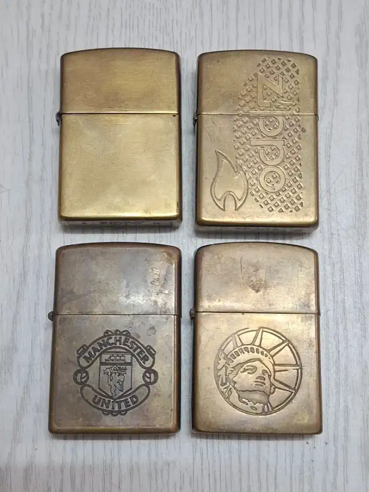 Zippo gold manchester united liberty flame (harga satuan)