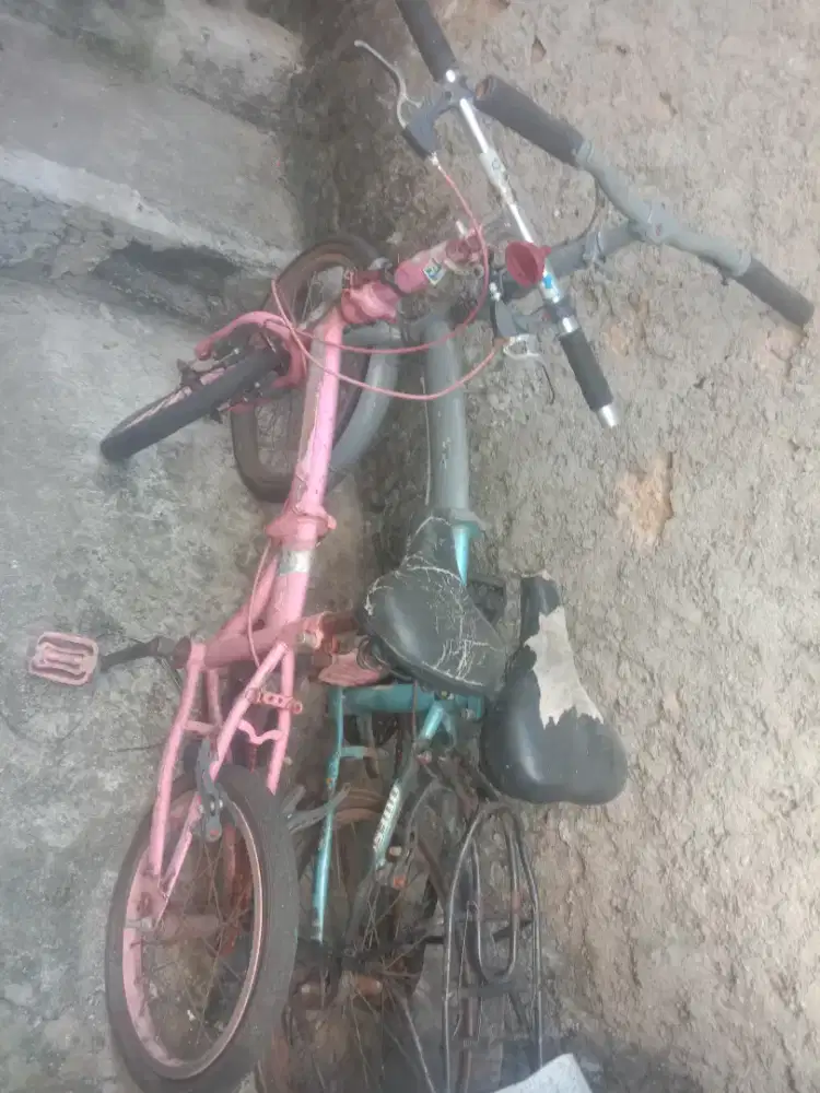 Sepeda lipat ukuran 16 sama 20